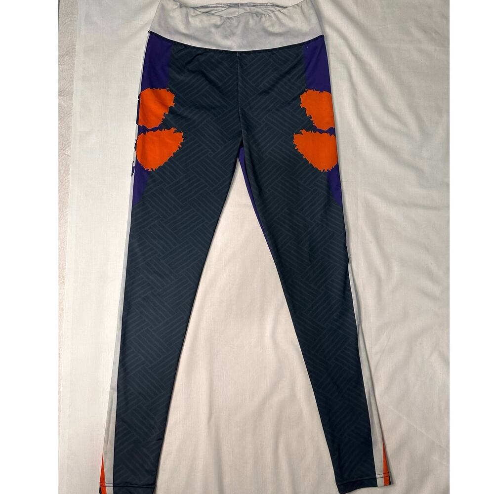 Clemson Tigers SC leggings with the tiger paws in the tigers colors size Small.
